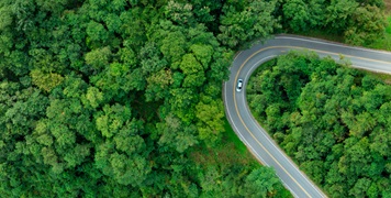 Aerial view on vehicle on road