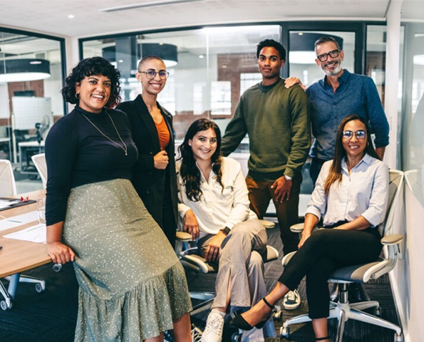 Diversity-team-sitting-in-the-office-workplace-culture-SG-Fleet Diversity-team-sitting-in-the-office-workplace-culture-SG-Fleet