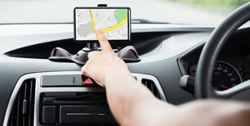 Female's Hand Using GPS Navigation