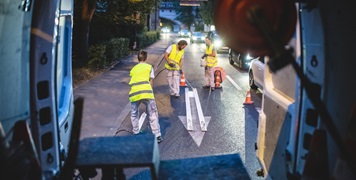 Interior View of Construction Crew Painting Street Marking
