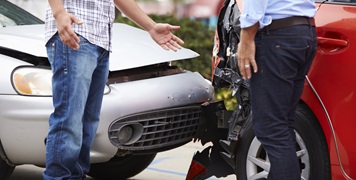 wo Drivers Arguing After Traffic Accident
