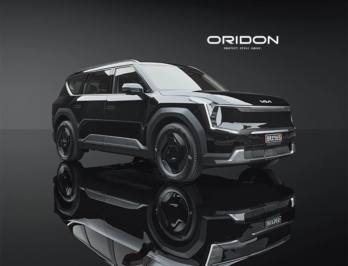 Glossy black Kia EV9 in-studio product shot.