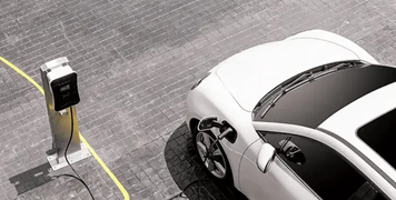 white-electric-vehicle-charging-in-parking-lot