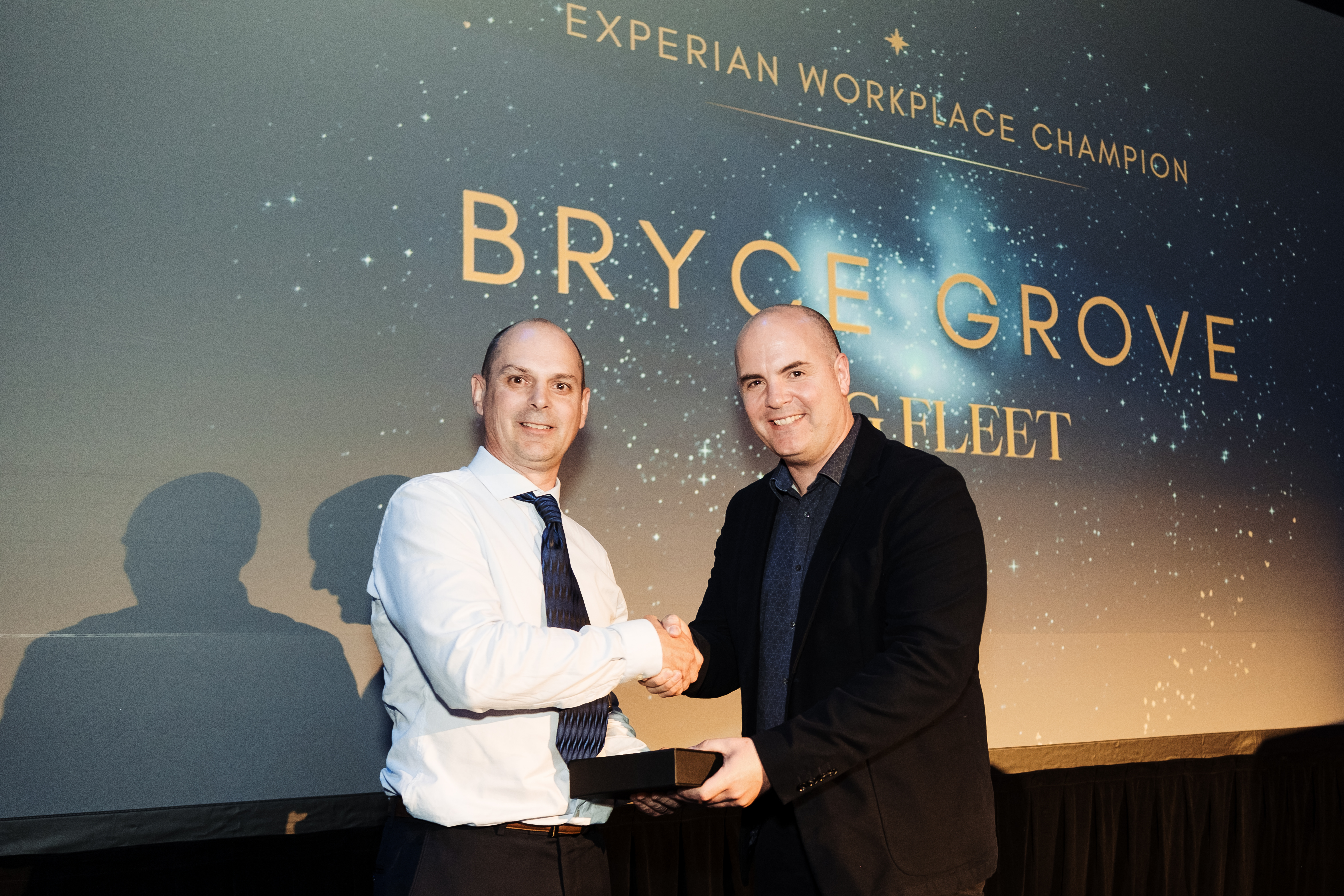 Bryce Grove accepting his award at the Financial Services Federation Awards evening in Auckland, New Zealand.