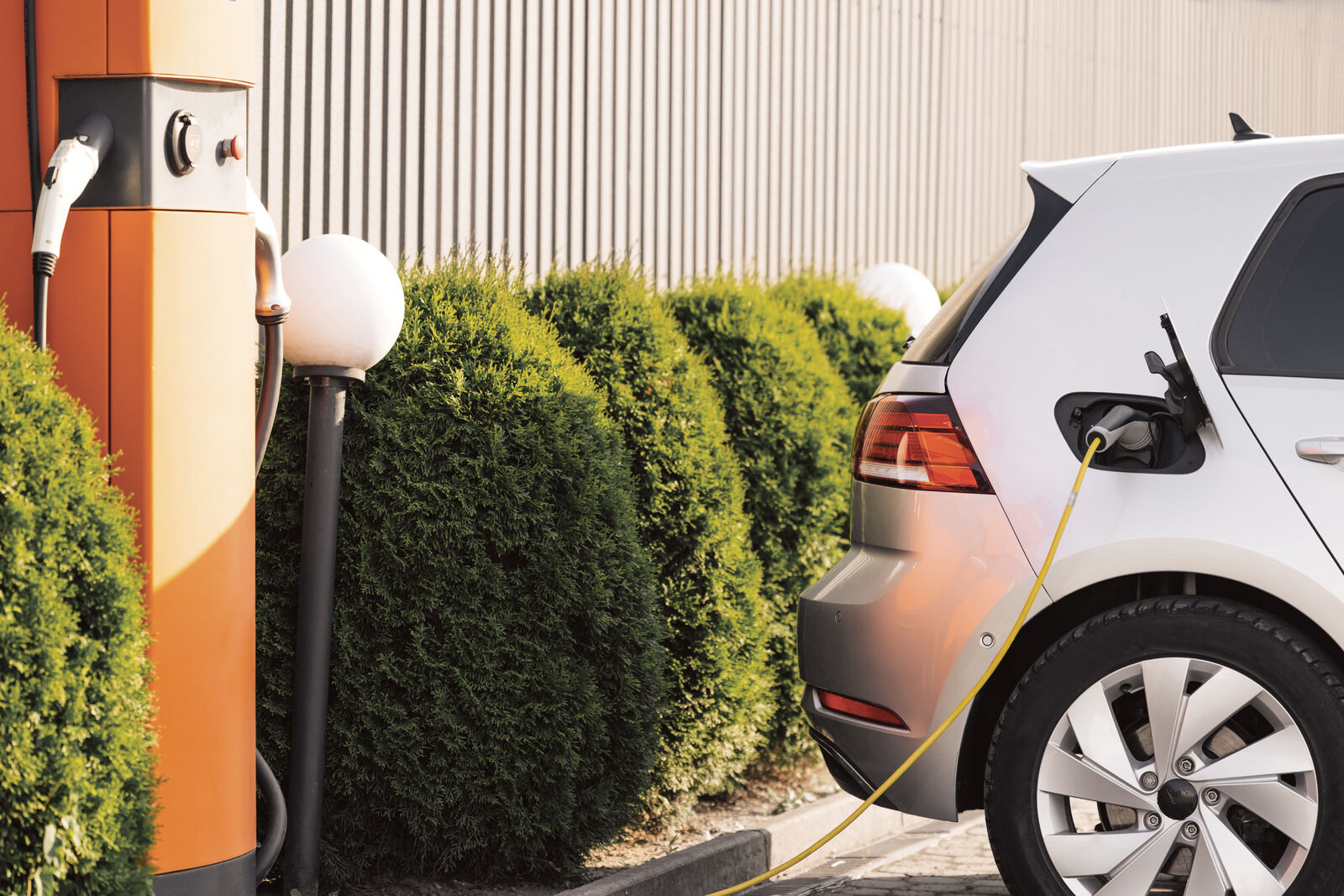 Electric vehicle charging outdoors at a commercial EV station, showcasing sustainable fleet transition in New Zealand.