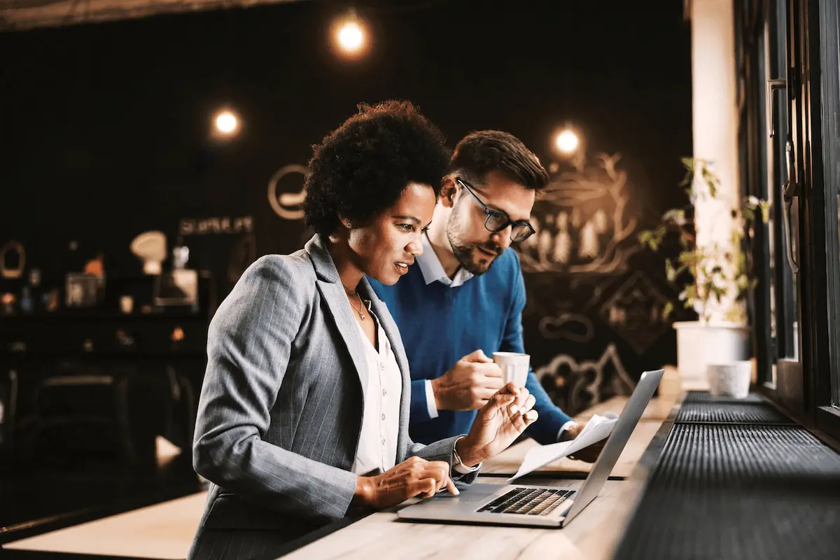 Two colleagues working side by side