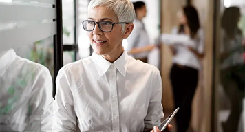Business woman holding tablet
