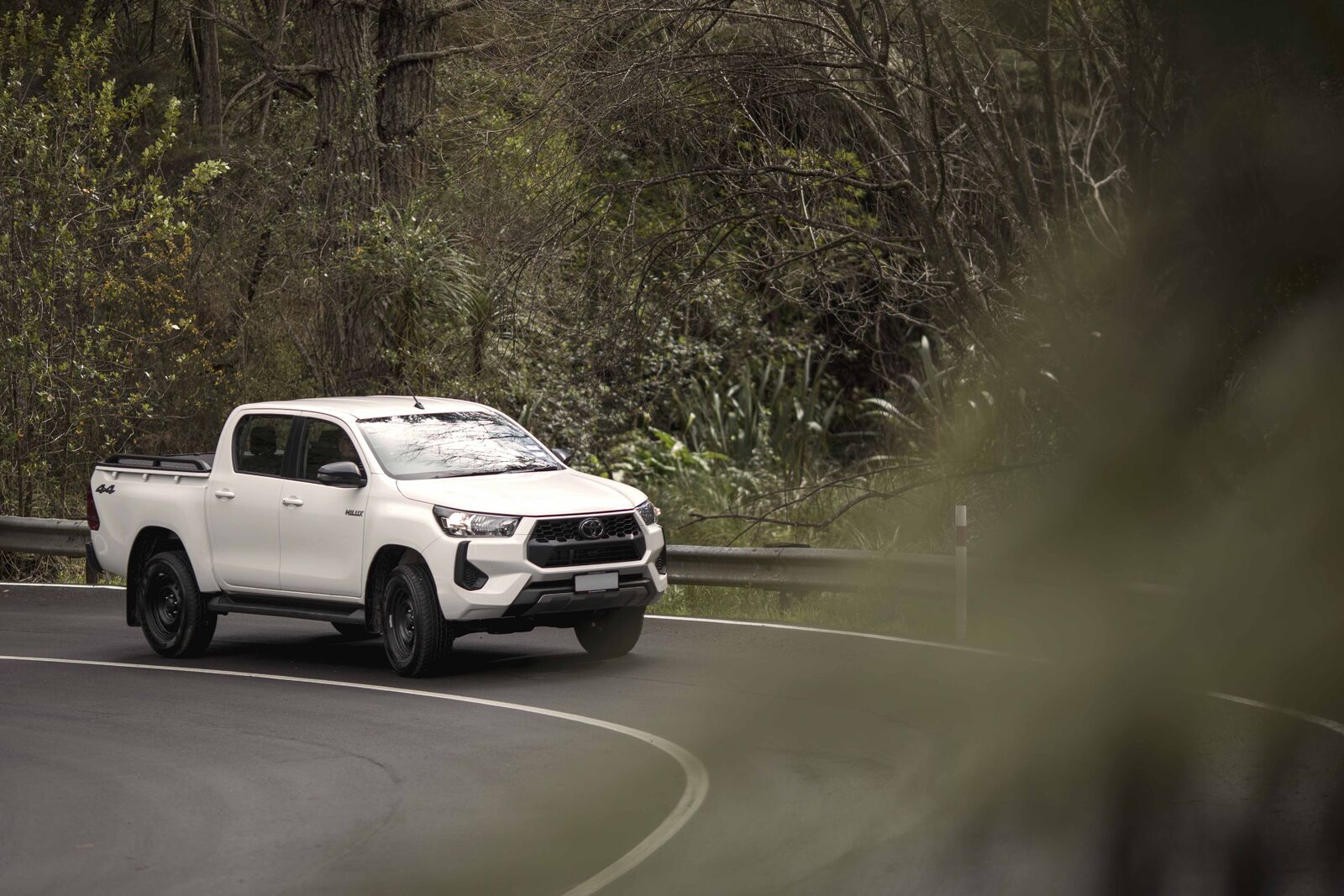 White ute driving on NZ road