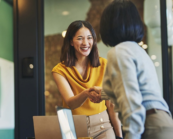 business-women-handshake business-women-handshake