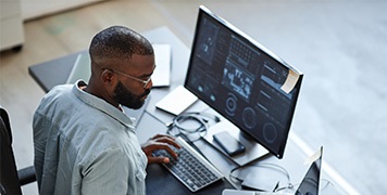 professional-on-desktop-and-laptop-working