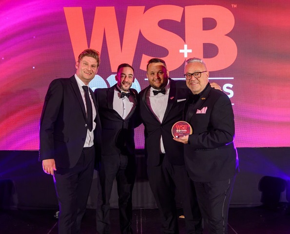 SG-Fleet-Winners-Photo-WSB-Award sg-fleet-staff-accepting-wsb-award-on-stage