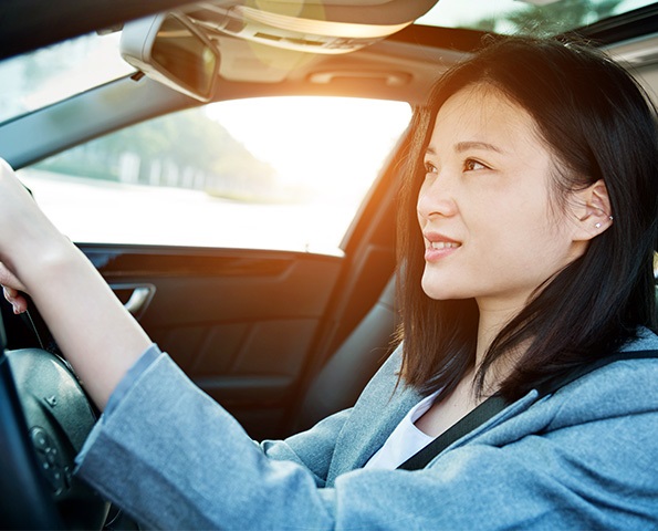 woman-driving-car-smiling woman-driving-car-smiling