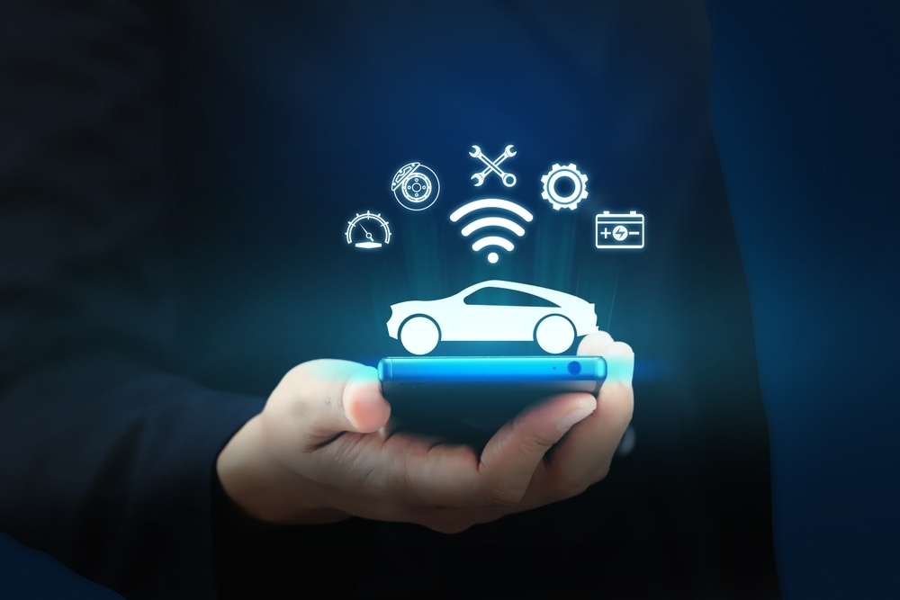 A smartphone with a stylised car maintenance image