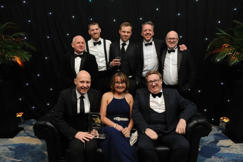 The SG Fleet team holding the leasing company of the year award