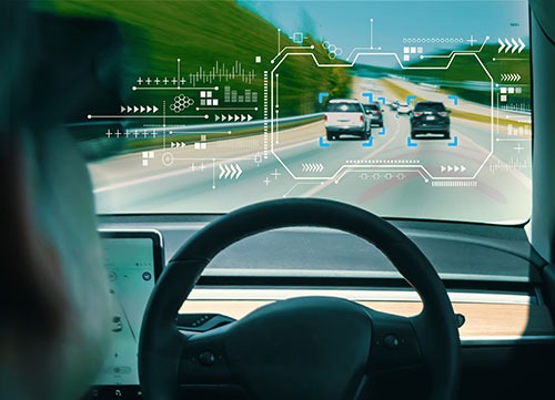 driver perspective on a road with AI screen
